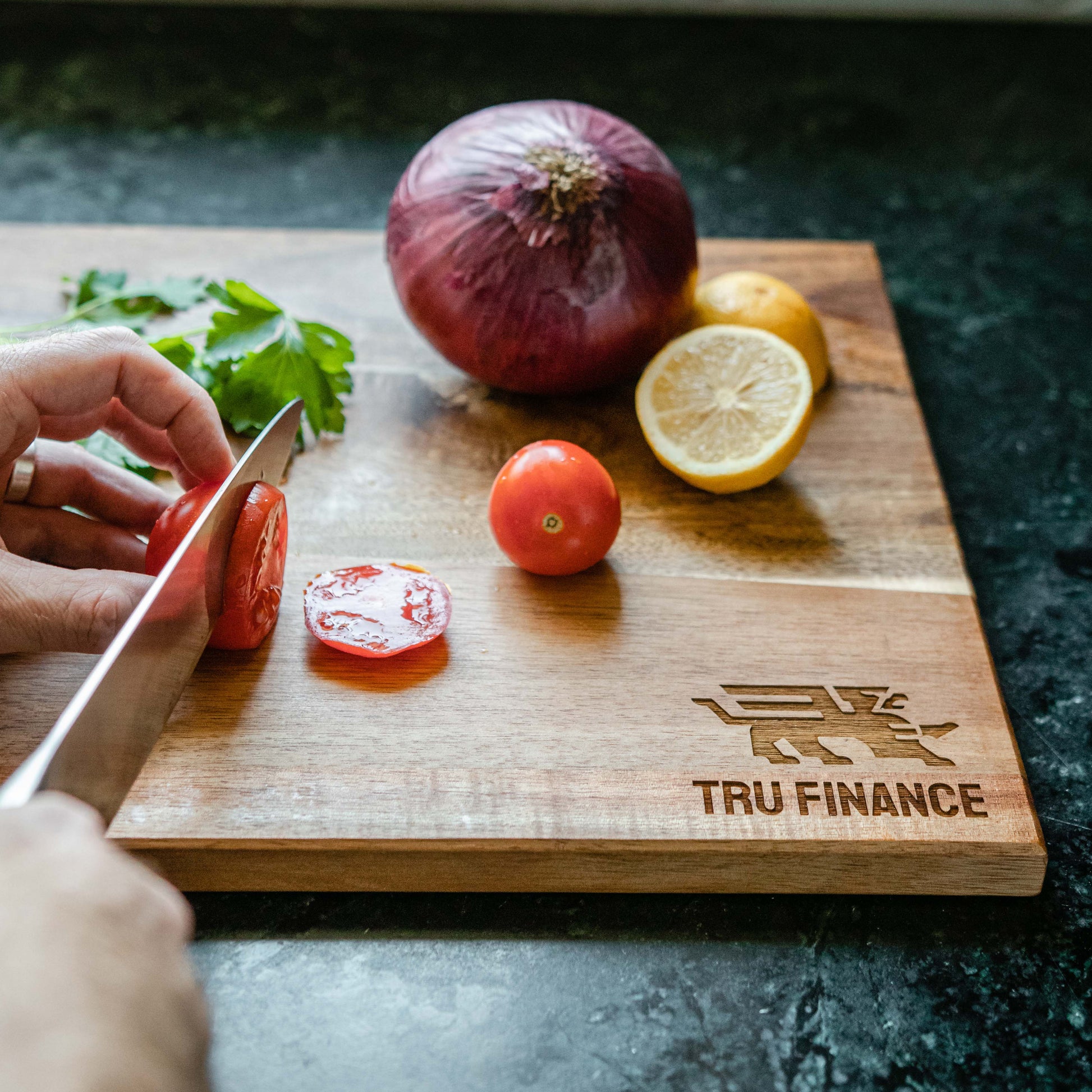 Branded Cutting Board cutting vegetables